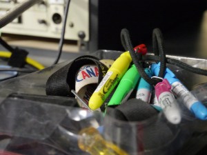 Things that are handy to have nearby: highlighters, markers, and pens. 