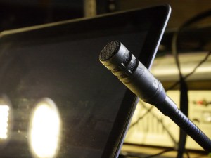 One of the microphones in the work stations available on the Hill's mobile production bus. 